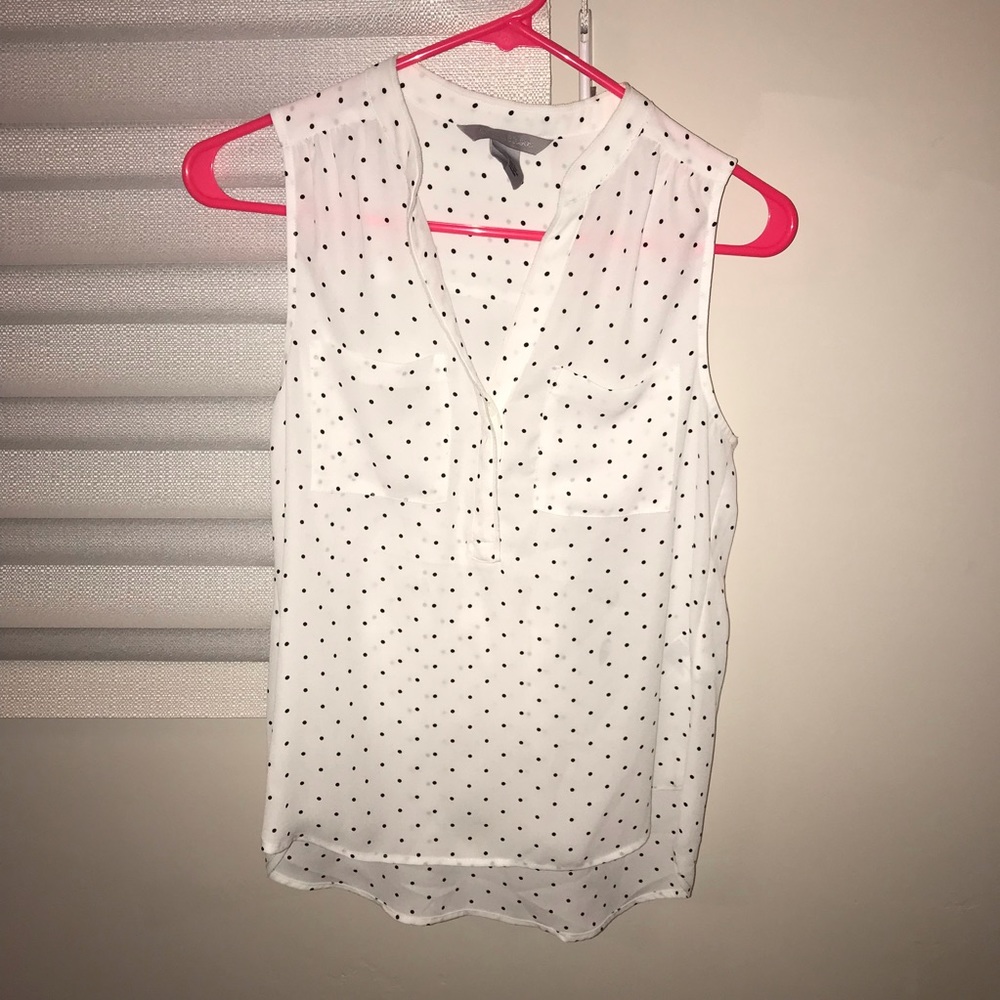 white with black polka dot shirt